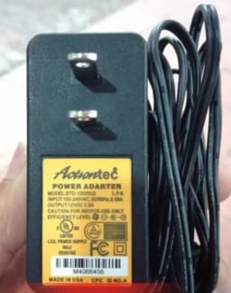 Adapter_CAMERA_12V2.5A_ACTIONTEC_màu_vàng